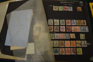 Stamp album and contents.