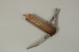 A 9ct GOLD PENKNIFE.