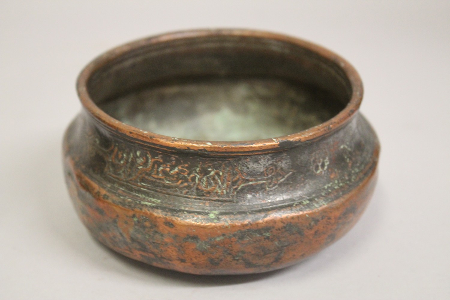 TWO SMALL PERSIAN 17TH CENTURY SAFAVID COPPER BOWLS, (2). - Image 4 of 6