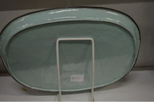 A Canton enamel oval tray painted with a panel depicting figures in a courtyard. - Image 2 of 2