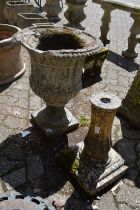 A reconstituted stone garden urn and a reconstituted stone base (faults).