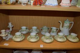 A Noritake coffee service and decorative candelabra.