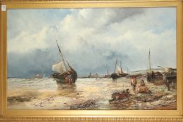 19TH CENTURY CONTINENTAL SCHOOL. Low tide, fisherfolk in the foreground with boats, town and