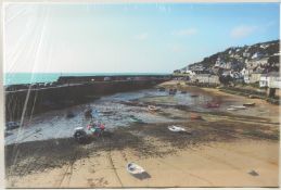DORA BERTOLUTTI HOWARD (b. 1957). A view of Mousehole Harbour at low tide, canvas print. 15.75