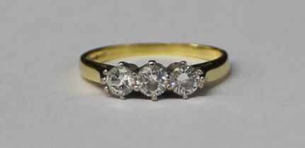 18ct gold 3 stone diamond ring, marked .5, size M, 2.87g