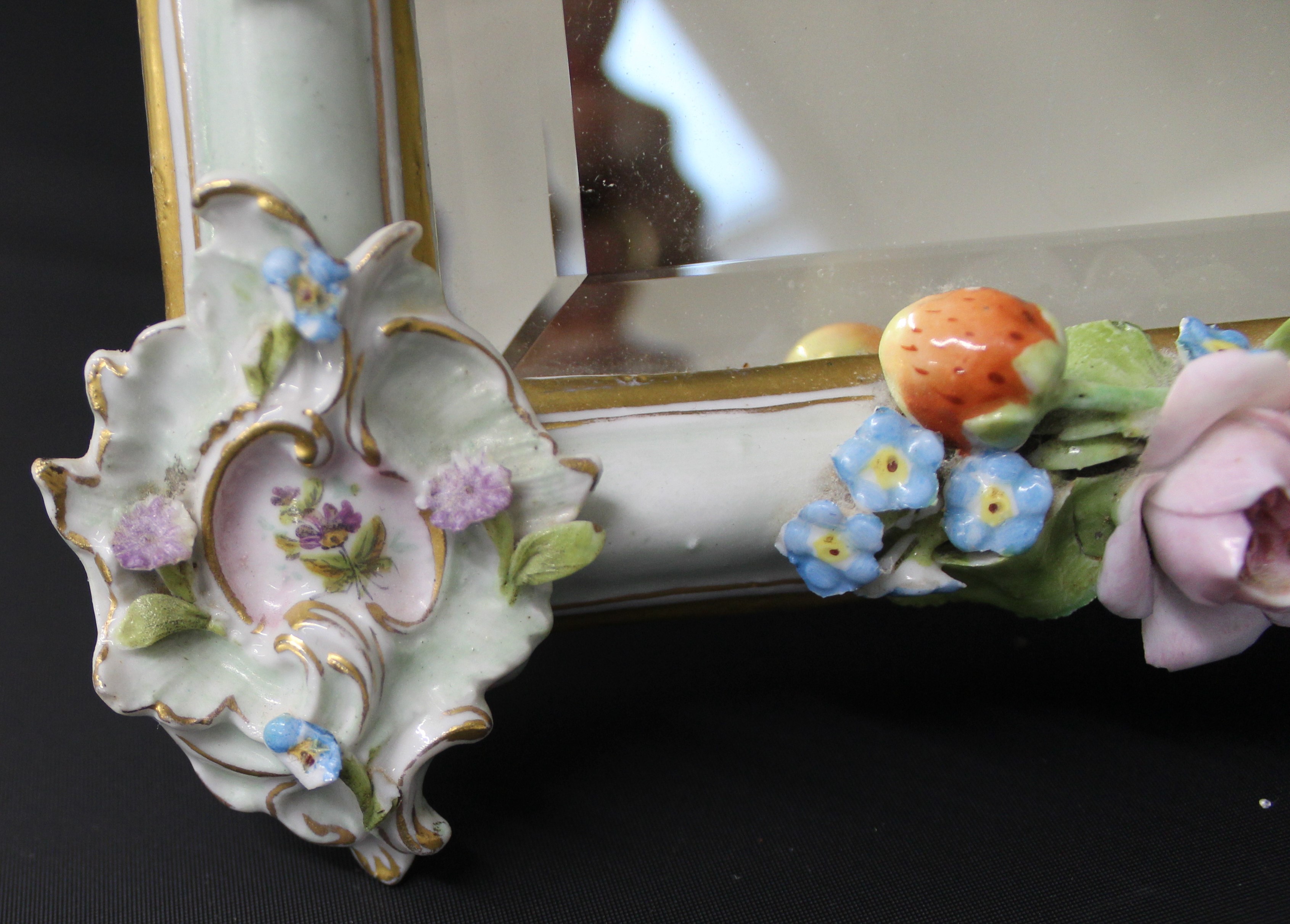 Thought to be Dresden China moulded frame strut mirror, with floral borders and putti (possible - Image 3 of 5