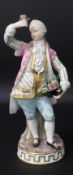 Porcelain figurine (Meissen / Meissen style) modelled as a man with raised hand holding a flower,