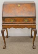 Good quality walnut veneer bureau on stand in the Queen Anne style on cabriole legs with ball & claw