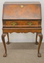 Good quality walnut veneer bureau on stand in the Queen Anne style on cabriole legs with ball & claw