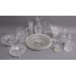 Collection of crystal and glassware includes vases, jugs and a large dish