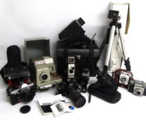 Collection of film and cine cameras includes Ricoh KR-10 super camera with Tamron 35-135mm f/3.5-4.2