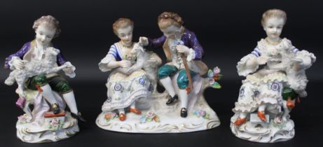 Sitzendorf porcelain figure group of a seated couple with lamb and two similar single figures, all