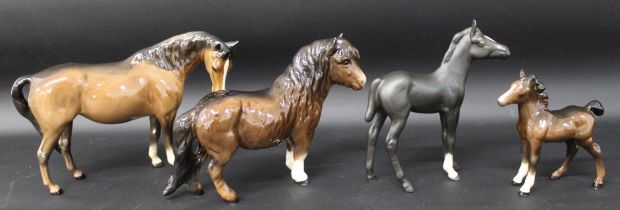 Four Beswick horses