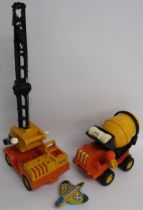 Fisher Price large crane 314 and cement mixer 315 also No. 203 tin aeroplane made in Hong Kong