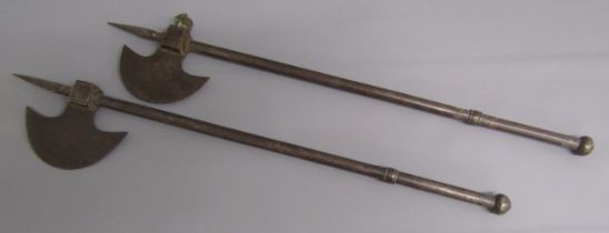 Pair of 19th Century possibly Indian battle axes / tabarzin with concealed daggers - one missing