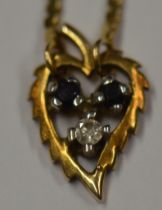 9ct gold necklace with attached heart shape diamond & sapphire set pendant 2.4g