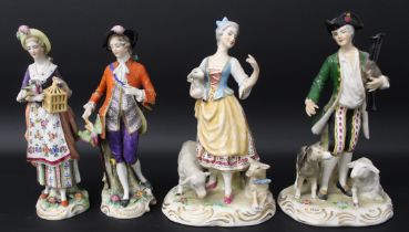 Pair of hand painted 20th century porcelain figurines bearing Sitzendorf type marks in the form of