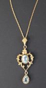 Tested as 9ct gold aquamarine pendant (4.80g) on 9ct gold chain (2.26g)