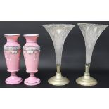 Pair of pink opaque glass vases with enamel decoration (chip / crack to one rim) 22cm tall & pair of