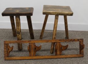 Two three legged stools & set of folding oak coat hooks