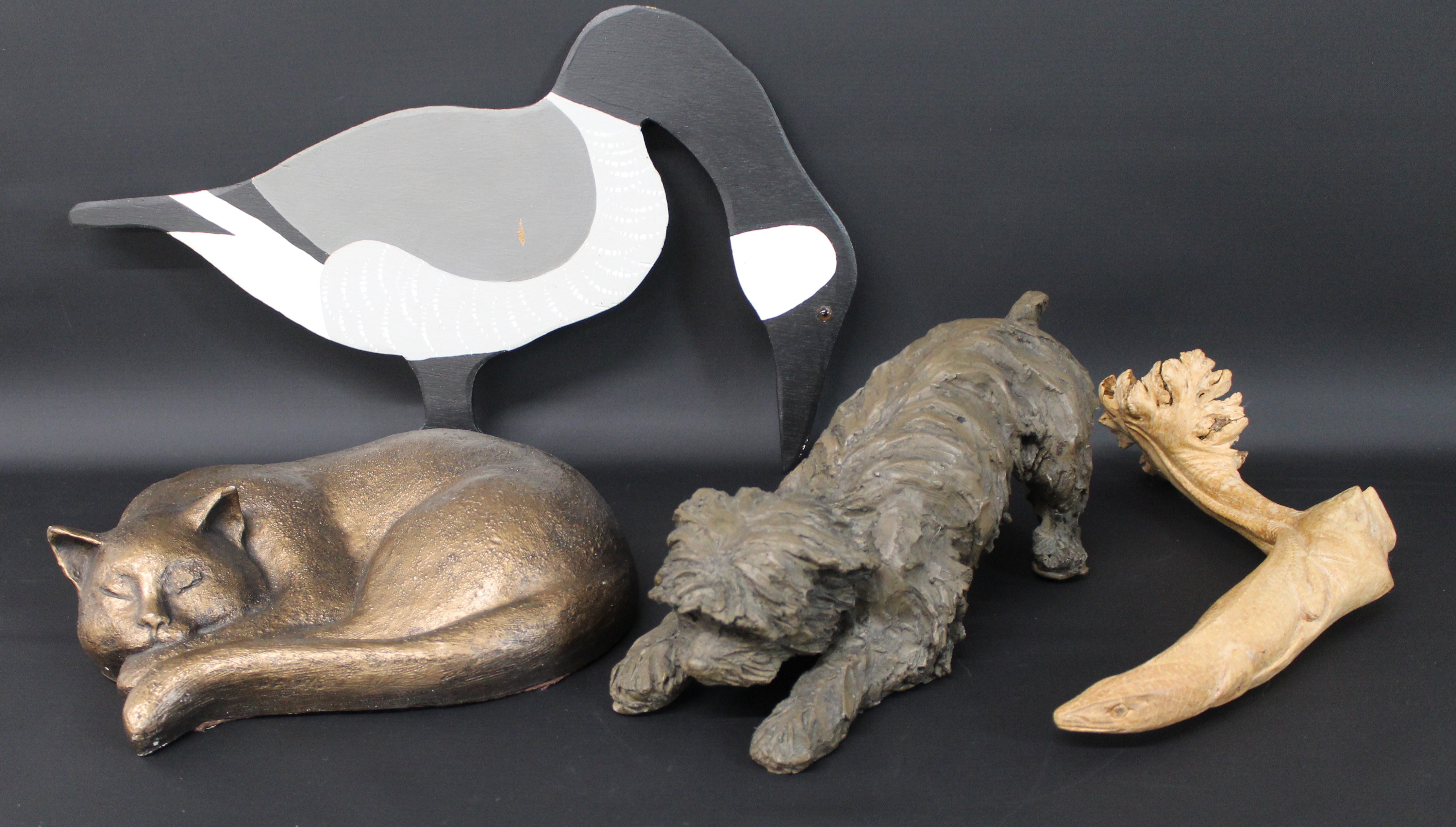 Carved wooden lizard, bronze effect terrier, sleeping cat & wooden goose