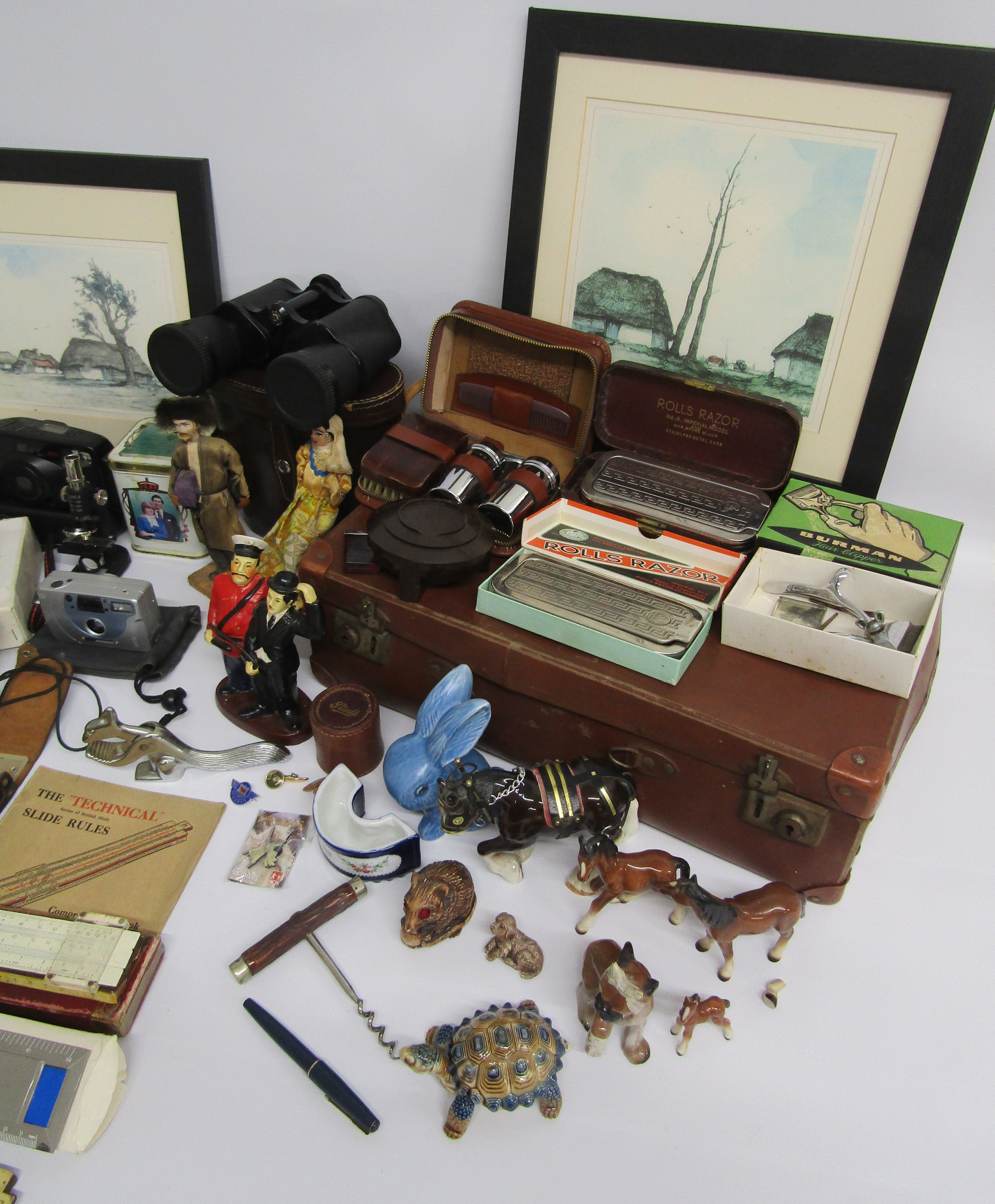 Case containing  Morris Minor small framed poster and pin badge, Rolls Razors, Dubarry bakelite - Image 3 of 10