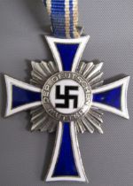 German decoration 'The Mother's Cross' Second Class - silver being awarded to mothers bearing 6-7