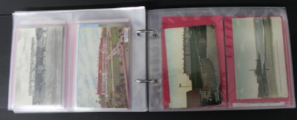 Album of approximately 114 golf related postcards depicting Saint Andrews, Turnberry, Gleneagles