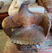 Large carved wood eagle chair stood on water buffalo legs