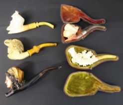 4 meerschaum pipes & a cigar holder with some cases