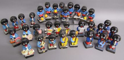 Golly figures includes new and old band members and football figures
