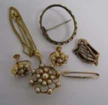 Tested as 9ct gold mounted earrings set with pearls and matching brooch pendant on yellow metal