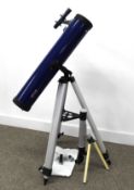 Optus Reflector telescope on tripod with various optics, instruction booklet, two astronomy