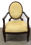 Open armchair with gold coloured upholstery