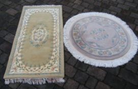 Circular rug approx. 116cm dia and rectangular rug approx. 158cm x 75cm (include tassels)