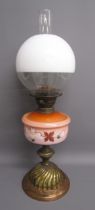 Brass and copper oil lamp with pink glass and hand painted design reservoir half white glass cover