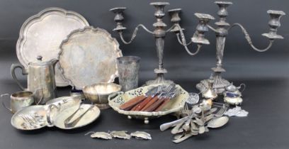 Quantity of silver plate including pair of candelabra, 2 mother of pearl forks with silver tines &