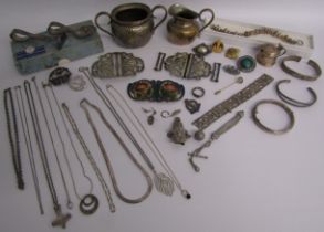Collection of silver necklaces, child's spoon and pusher, Scotland silver brooch also silver plate