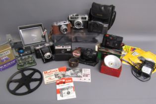 Collection of cameras includes - Dacora Varo made in Germany, Instamatic 50 camera, Canon 35mm,