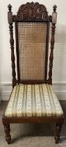 Reproduction 17th century high back chair with cane back panel