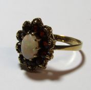 9ct gold opal and garnet ring - ring size R - total weight 4.05g