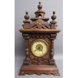 Early 20th century stained oak mantel clock (bearing crossed arrows mark to face) - music box