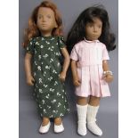 2 Sasha dolls - red hair blue eyes with green dress and black hair brown eyes with pink dress