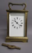 Brass timepiece carriage clock with key - 11.5cm x 6cm x 8cm (excludes handle)