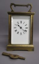 Brass timepiece carriage clock with key - 11.5cm x 6cm x 8cm (excludes handle)