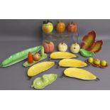 Collection of food and leaf design pots includes Carltonware banana dishes, bean carrot and onion