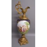 Sevres ewer style jug - with painted panel depicting a couple and cupid and gilt metal base and