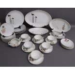 Meito Oriental design dinner service includes platters, tea cups and saucers, plates, side plates (