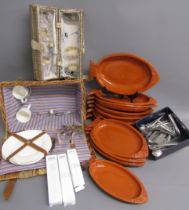 Large collection of Olympia cutlery, terracotta fish shaped dishes, varying sizes, wicker hamper and