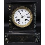 Small black slate mantel clock with marble inserts